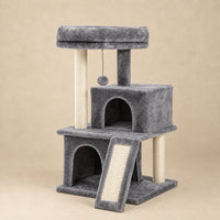 Petit arbre à chat Mabel gris de 86 cm avec deux niches et une rampe sur fond beige